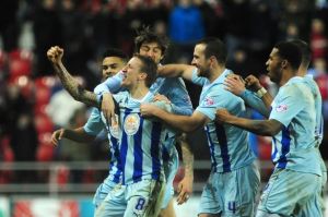 Carl Baker's trickling effort from the half-way line sealed victory at Rotherham