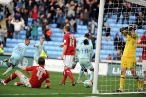 Former Coventry keeper Luke Steele looks on in anguish having conceded a goal to Clive Platt